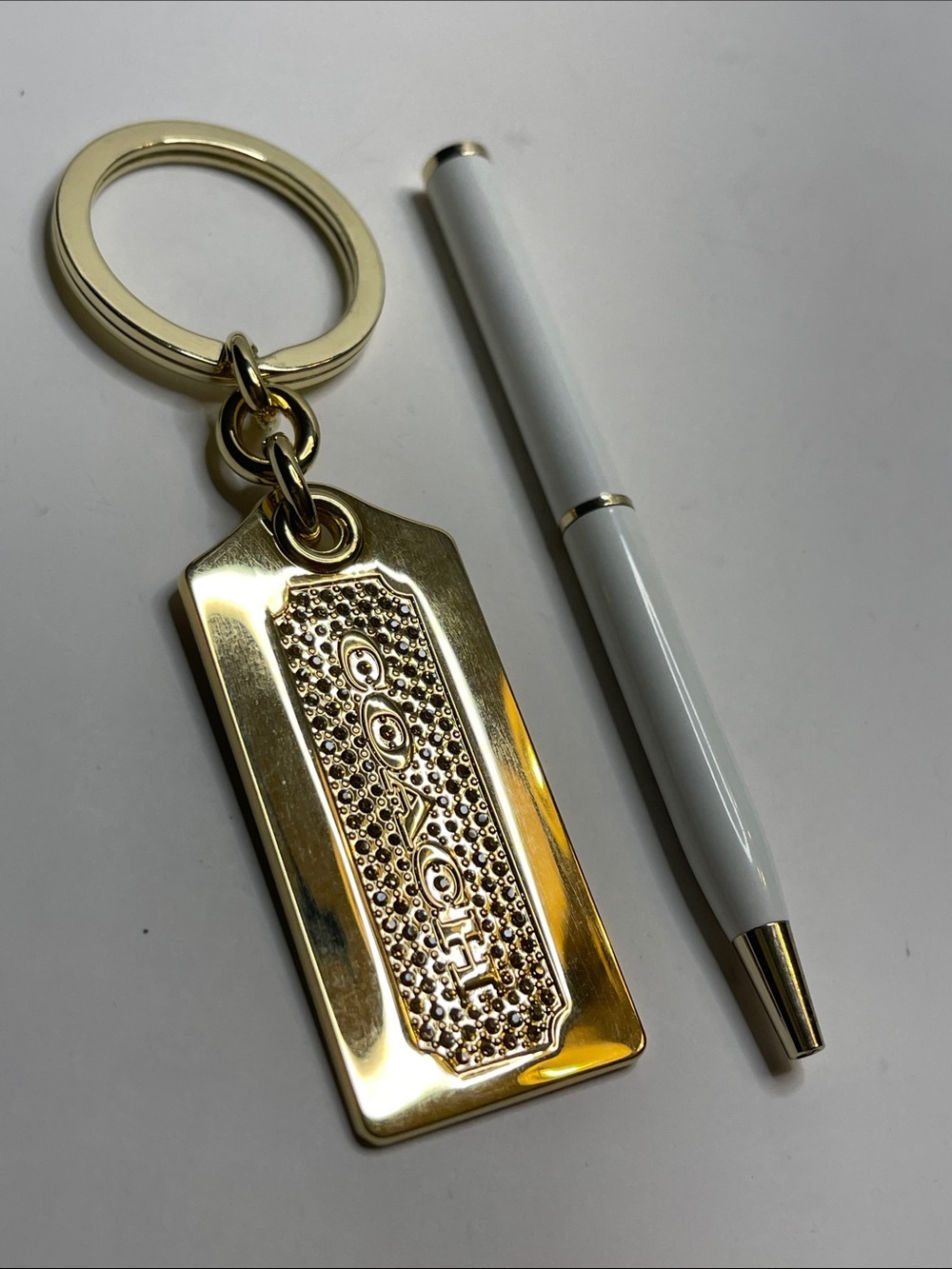 Coach Gold-tone Rectangular Logo Keyring